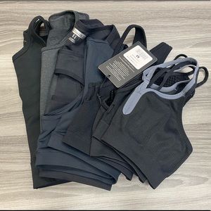 Lot of 7 black sports bras Size Medium